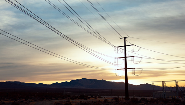 Sunrise behing the GridLiance transmission lines Sunrise behing the GridLiance transmission lines